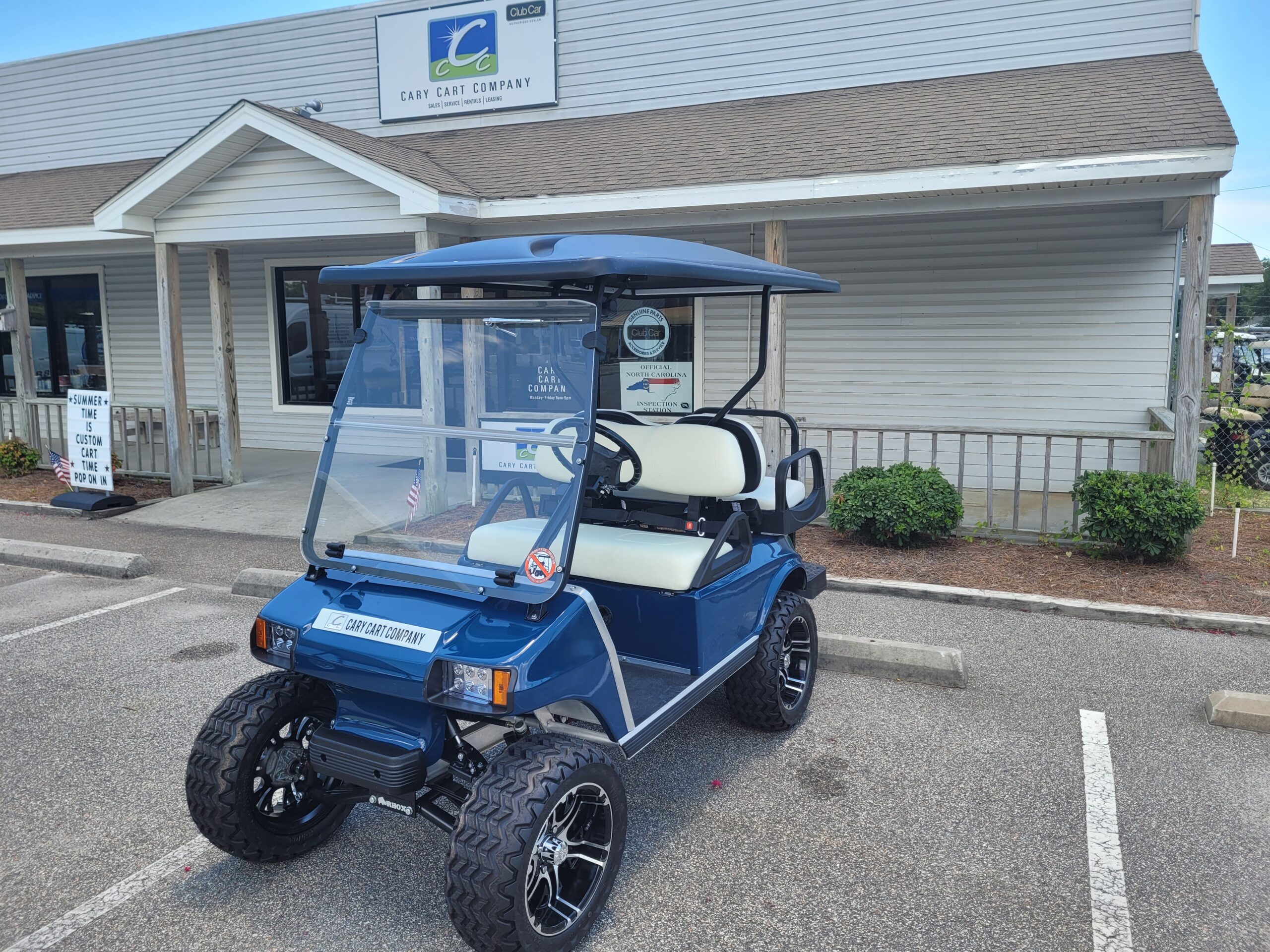 Club Car DS Lifted Blue 4 Passenger Cary Cart Co